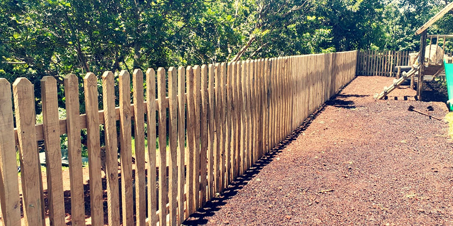 Wooden fencing in Ballito defining a garden boundary inside a residential estate